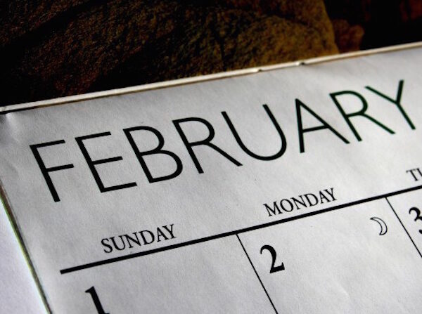 A close up of the calendar with the word february written on it