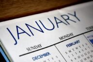 A close up of the calendar with the word january written on it