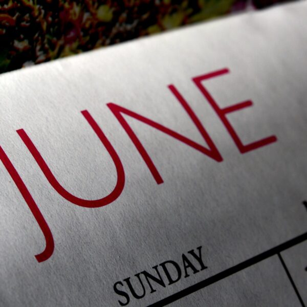 A close up of the word june on a calendar