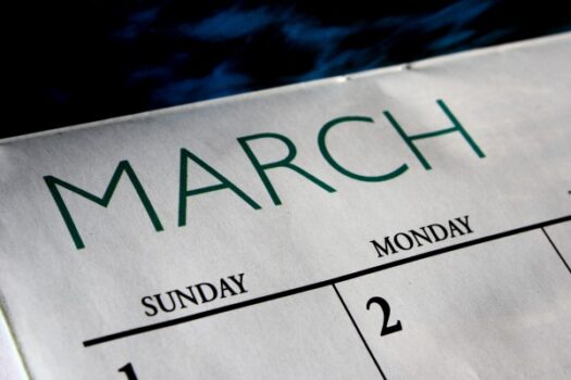 A close up of the word march written on a calendar