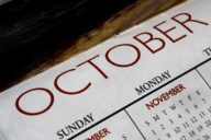 A close up of the calendar with october written on it
