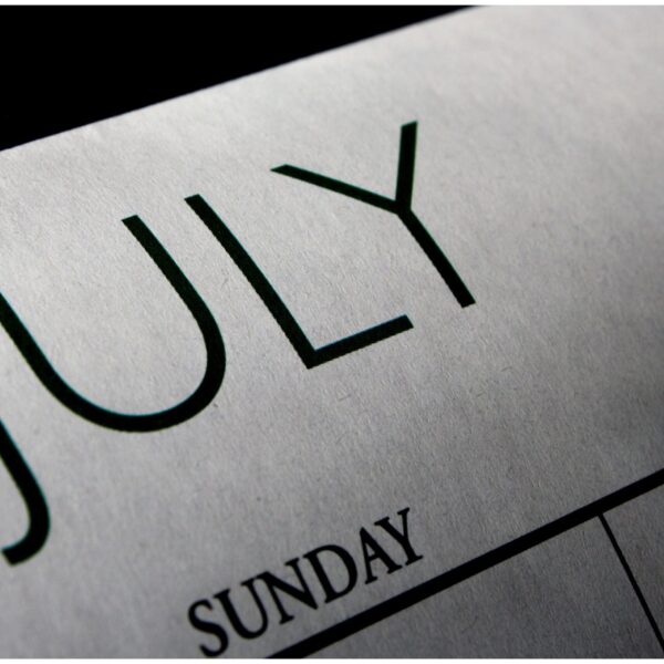 A close up of the word july written on a calendar